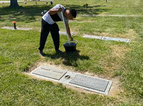 cleaning gravestones.png